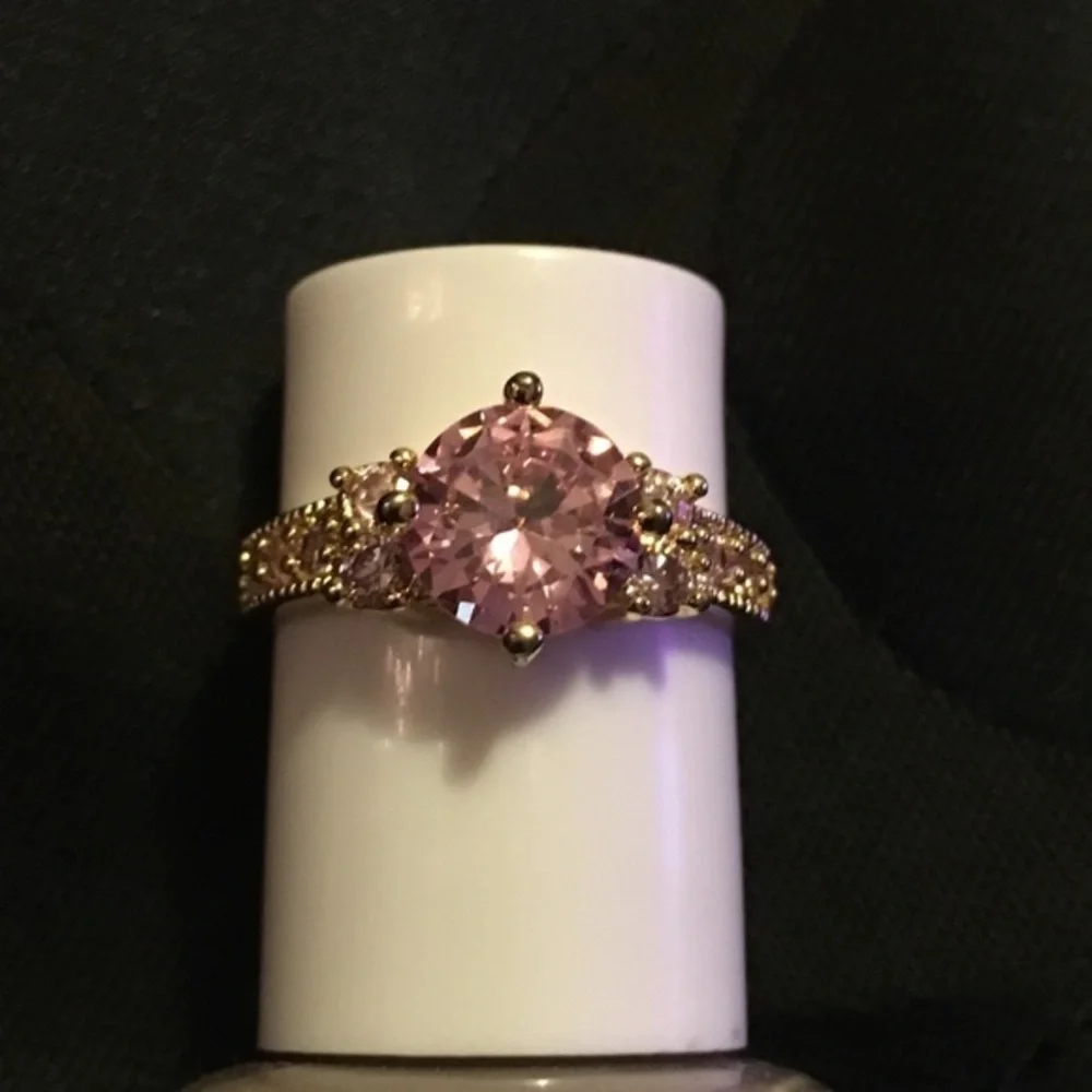 Woman’s Pink sapphire ring Gold Tone size 8